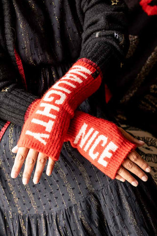 The Naughty or Nice Handwarmers being worn by a model.