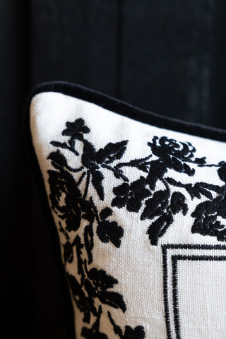 Detail image of the Normal Is Boring Embroidered Rectangular Cushion