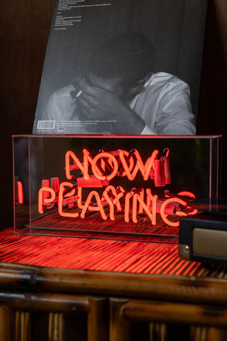 Lifestyle image of the Now Playing Neon Light Box