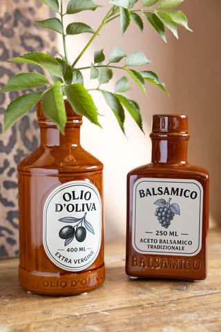 The Olio d'Olivia Ceramic Bottle Vase shown next to the matching Balsamico Vase. 