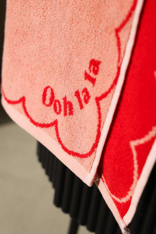 Close-up of the writing on the Ooh La La Hand Towel