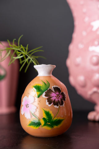 Lifestyle image of the Orange Hand-painted Floral Glass Vase