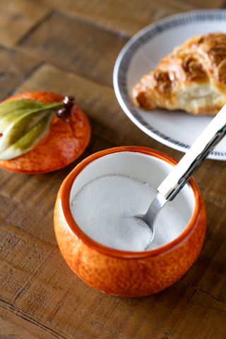 Close-up image of the Orange Storage Jar