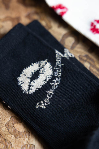 Close-up of a pair of socks from the Pack Of 4 Lips Printed Socks.