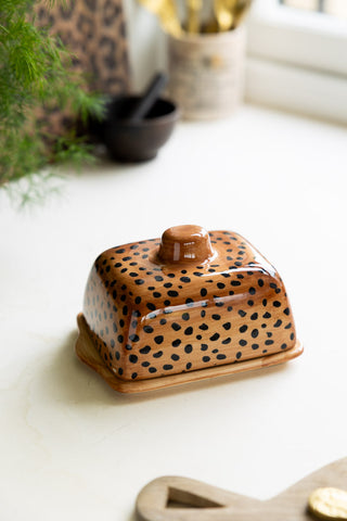 Lifestyle image of the Painted Leopard Print Butter Dish