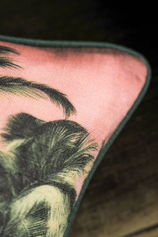 Detail of the corner of the Palm Paradise Cushion with Piped Edge