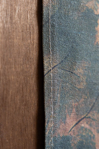 Close-up of the stitching on the Palm Tree Canvas Wall Hanging.