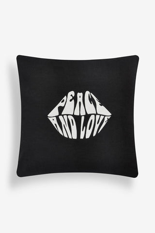 Image of the Peace and Love Knitted Lips Cushion on a white background