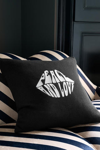 Image of the Peace and Love Knitted Lips Cushion