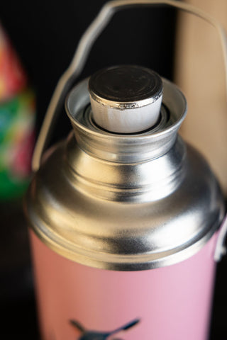Image of the top of the Pink Painted Bird Decorative Flask