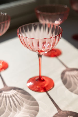 Lifestyle image of the Pink Champagne Glass