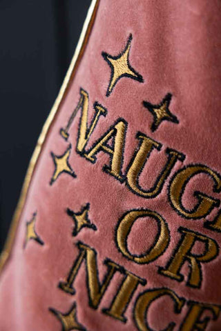 Close-up image of the Pink Naughty Or Nice Velvet Christmas Stocking