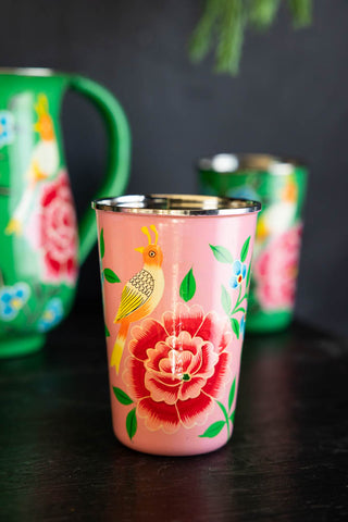 Lifestyle image of the Pink Painted Bird Stainless Steel Tumbler