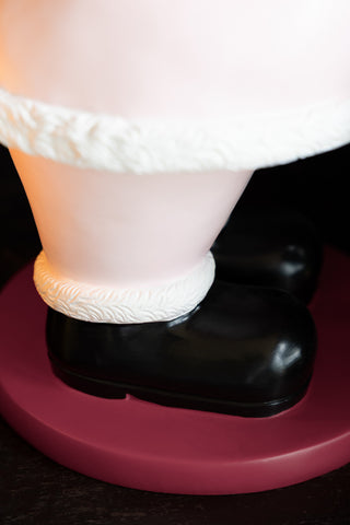 Close-up of the base of the Pink Santa Butler Christmas Decoration.
