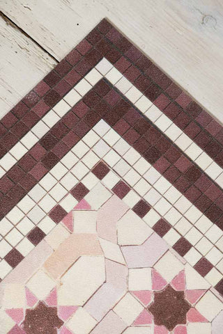 The corner detail of the Pink Star Durable Floor Mat. 