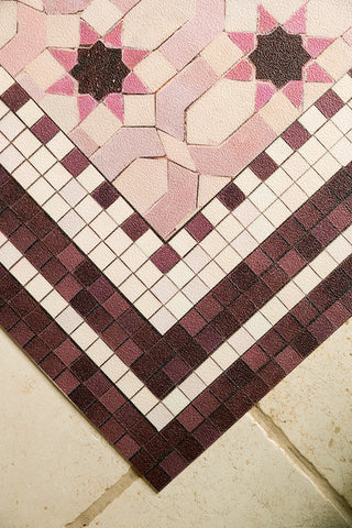 A detail showing the tile-effect border on the Pink Star Durable Runner. 