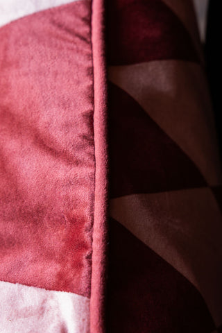 Detail image of the Pink & Red Embroidered Star Cushion