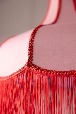 Close-up image of the Pink & Red Tassel Edge Ceiling Light