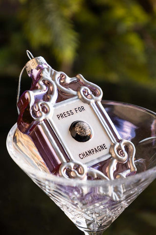 Close-up image of the Press For Champagne Glass Christmas Tree Decoration