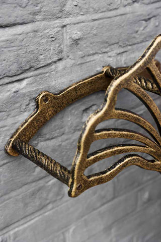 Image of the Pretty Antique Brass Hose Holder attached to the wall