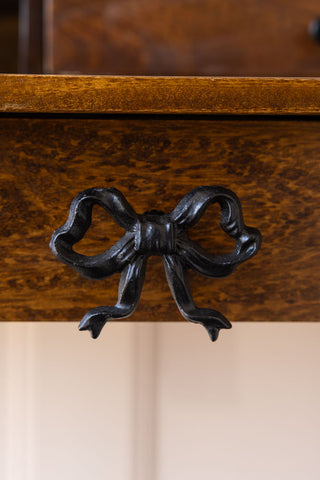 Close-up image of the Pretty Black Bow Cupboard/Drawer Knob