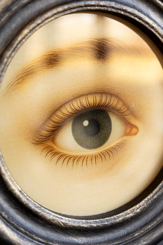 Close-up of the detail of the Vintage-Style Pretty Eye Framed Wall Art.