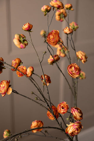 Detail image of the Pretty Faux Ranunculous Stem in Blood Orange