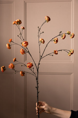 Image of the stem for the Pretty Faux Ranunculous Stem in Blood Orange