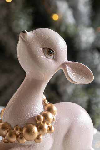 Image of the finish on the Pretty Pink Sitting Deer Ornament