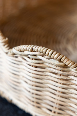 Close-up image of the Pretty Round Rattan Scalloped Tray