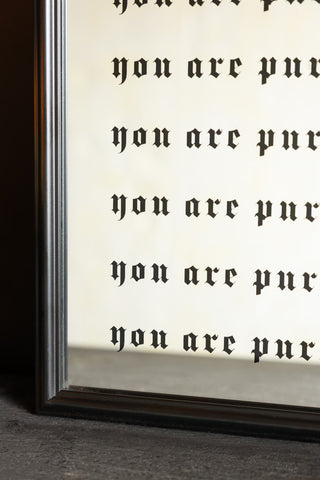 The gothic text of the Pure Fucking Magic Decorative Mirror.