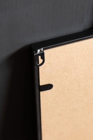 The fixing on the back of the Pure Fucking Magic Decorative Mirror.l