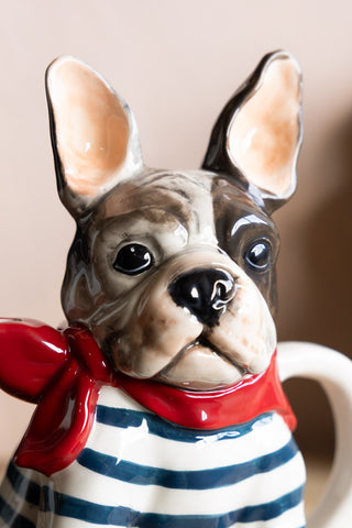 A close up focusing on the face of the Quirky French Bulldog Teapot. 