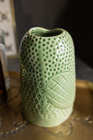 The Quirky Green Owl Bud Vase seen from the side.