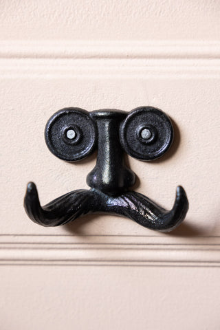 Close-up image of the Quirky Moustache Cast Iron Coat Hook