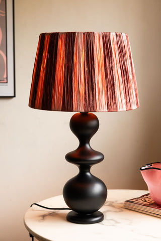 Lifestyle image of the Raffia Pink & Red Stripe Lampshade