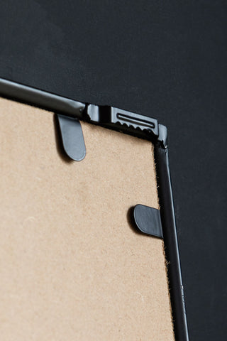 Close-up of the fixing on the reverse side of the Really Can't Be Arsed Wall Mirror.