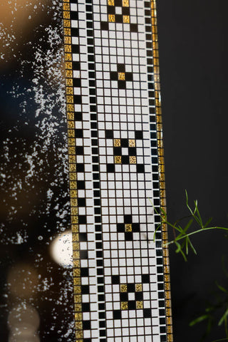 The tile border on the Stunning Mosaic Tile Wall Mirror. 