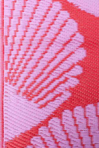 Detail image of the Recycled Plastic Garden Rug In Pink & Red