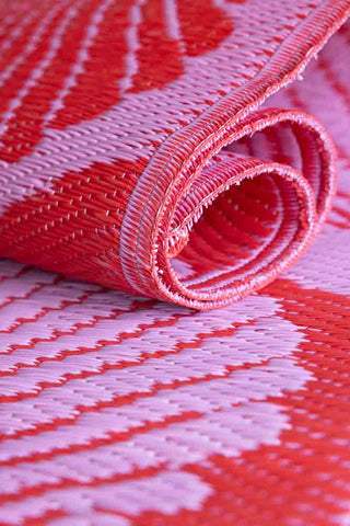 Image of the Recycled Plastic Garden Rug In Pink & Red
