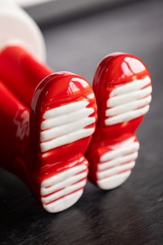 Close-up of the base of the Red Boot Small Indoor Planter.
