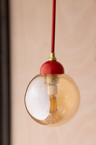 Close-up image of the Red Glass Dome Metal Ceiling Light
