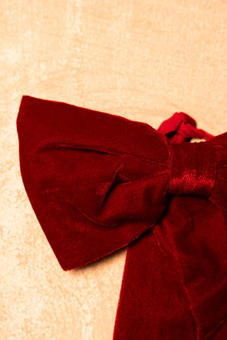 Close-up of the Red Velvet Bow Christmas Decoration.