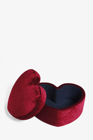 The Red Velvet Heart Footstool With Storage with the lid removed showing the storage inside, on a white background.