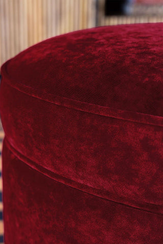 Close-up of the edge of the top of the Red Velvet Heart Footstool With Storage.