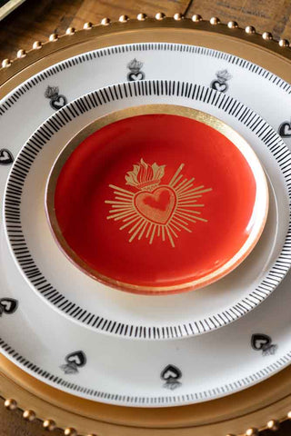 Image of the Red & Gold Milagro Heart Decorative Wall Plate on a table setting