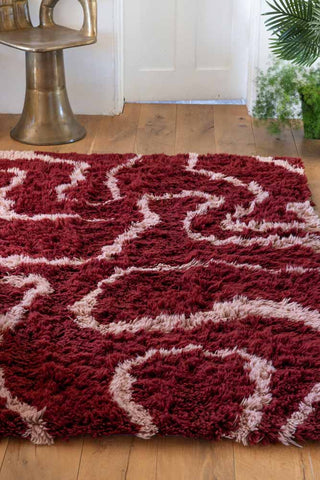 Close-up image of the Red & Pink Swirl Berber Rug - Available in 5 Sizes