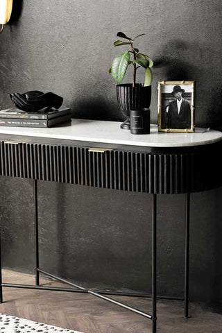 Side close-up image of the Reeded Black Wood & Marble Console Table