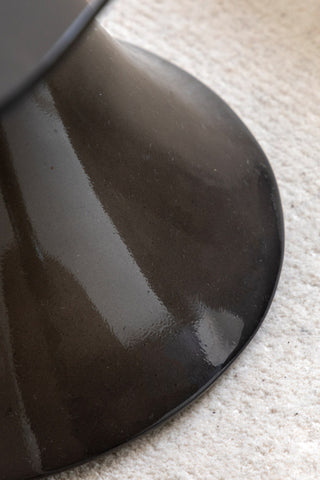 Close-up of the base of the Retro Asymmetric Side Table in Espresso.