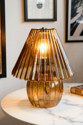Lifestyle image of the Ribbed Amber Glass Table Lamp